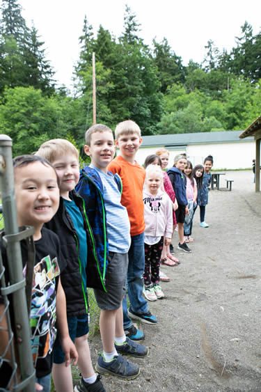 children-outside Kids lined up outside